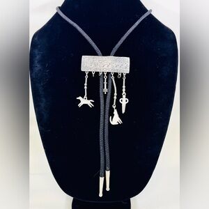JJ Jonette 1988 Silver & Black Southwest Theme Bolo Necklace W/Dangling Charms